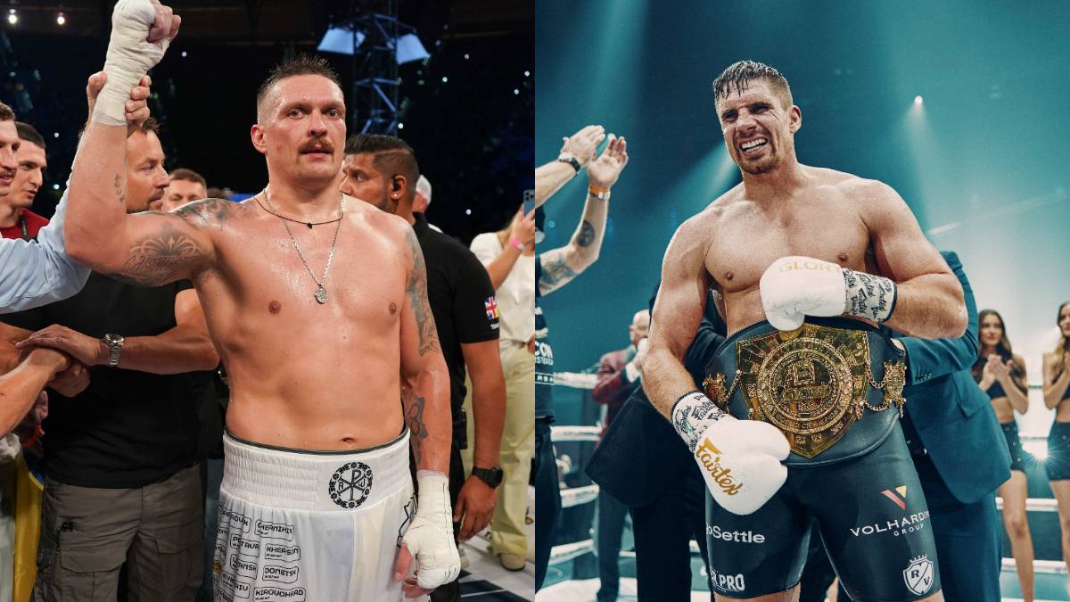 Олександр Усик та Ріко Верховен з поясами на рингу перед андеркардом