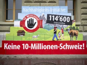 Плакат проти 10-мільйонної Швейцарії з 114600 підписами за ліміт населення