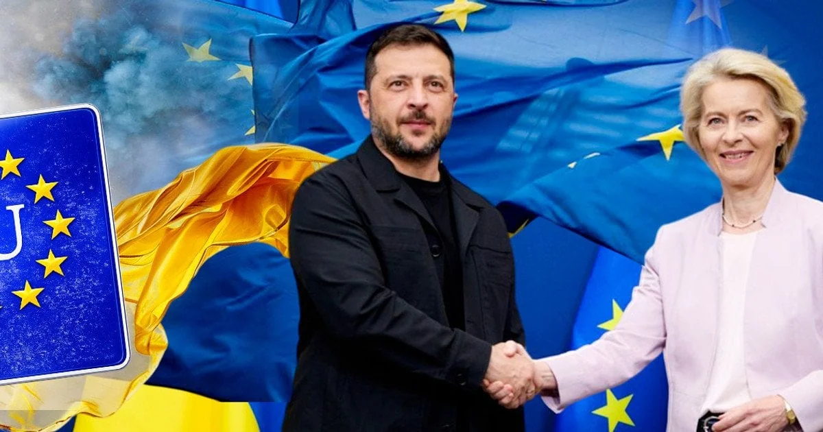 Президент Зеленський тисне руку Урсулі фон дер Ляєн на тлі прапорів України та ЄС